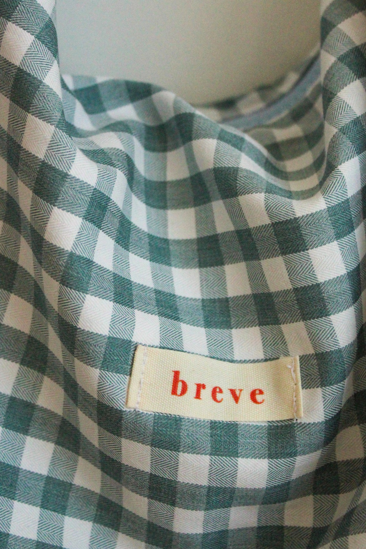 Sac réversible rose/carreaux bleus
