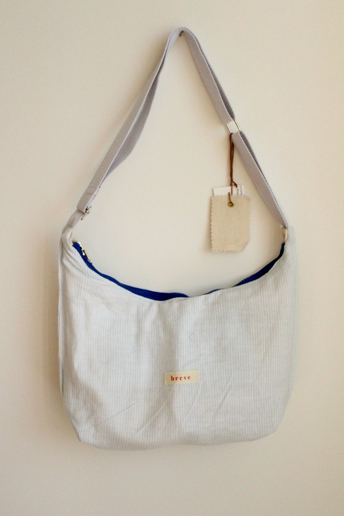 Sac réversible beige/rayé bleu